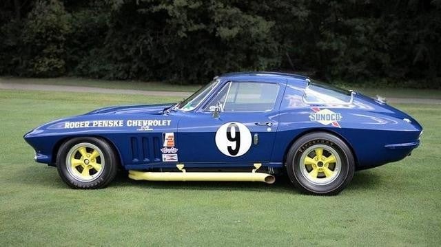 Corvette blue Racing car parked on grass