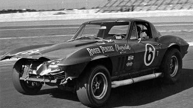 Corvette blue Racing car parked on grass