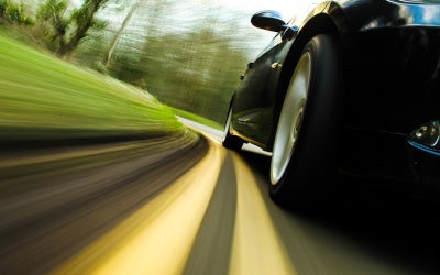 car driving on road way